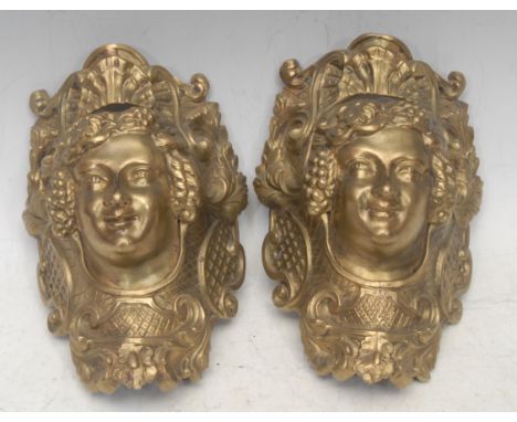 A pair of Rococo Revival gilt bronze billiard or snooker table pockets, the fall fronts cast as Maenad masks, foliate scroll 