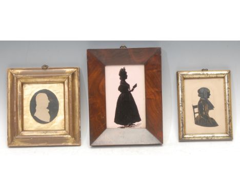 English School (19th century), a cut paper silhouette, half length portrait of G. Smith at five years old, heightened in gilt