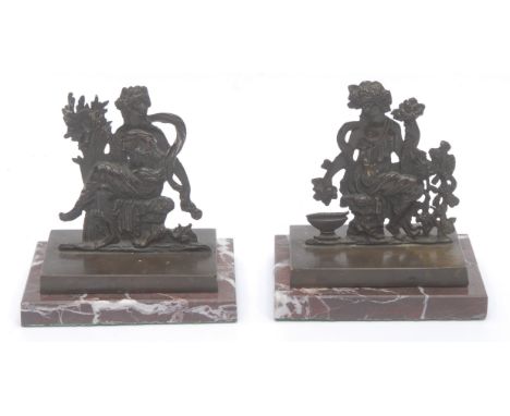 A pair of 19th century Roman style bronze mounted desk weights, depicting Ceres (Autumn) and a Maenad (Summer), in the Grand 
