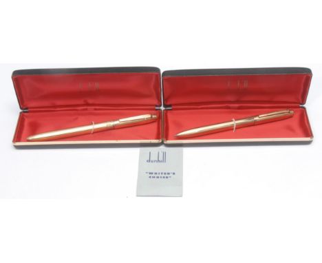 Pens - a Dunhill ballpoint pen, engine turned, 14cm long, boxed; another, similar (2)