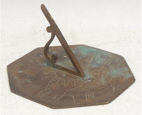 An early 20th century bronze octagonal sundial, inscribed I mark the Bright Hours (sic), 15.5cm diam