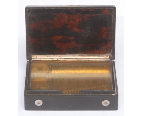 A 19th century tortoiseshell rectangular music box, 6cm barrel playing on a one-piece comb, the hinged cover inlaid with an o
