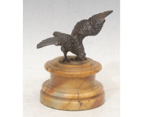 A French Empire style desk weight, mounted with a patinated bronze eagle with wings addorsed, Siena marble socle base, 12.5cm