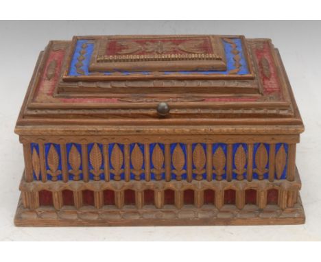 An Italian softwood trinket box, carved throughout with stiff leaves and geometric shapes, hand-painted and velvet mounted in