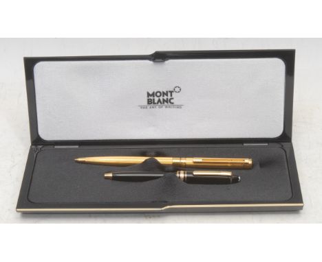 Pens - a Montblanc Meisterstuck ballpoint pen, 11cm long; another, engine turned, 14.5cm long (2), associated box