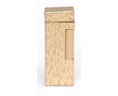 A Dunhill Rollagas cigarette lighter, gold plated bark-textured case, 6.5cm long