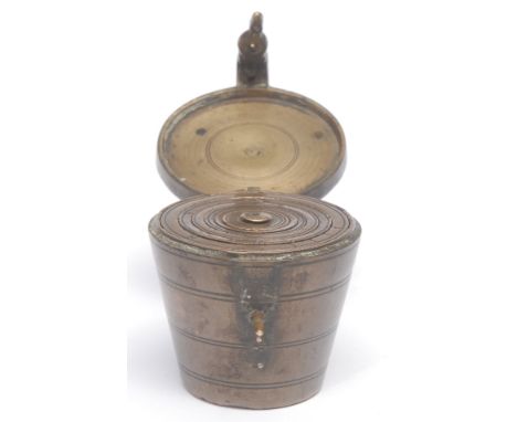 A set of Nuremburg bronze nesting cup weights, 4.5cm high overall, 18th/19th century