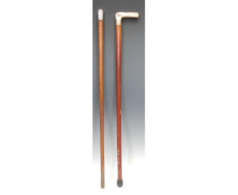 A Chinese silver coloured metal mounted walking stick, the pommel chased with flowers and birds, malacca cane, 87.5cm long, u