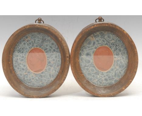 The Cult of Napoleon and the Napoleonic Wars - a pair of terracotta portrait intaglio impressions, depicting Napoleon Bonapar