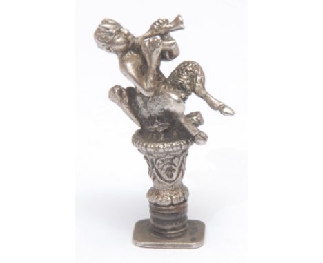 Seals - a 19th century silver coloured metal desk seal, cast as a faun playing pipes, the intaglio matrix with a ship, 4.5cm 