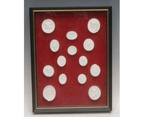An arrangement of Grand Tour style plaster intaglio impressions, 29.5cm x 23cm overall