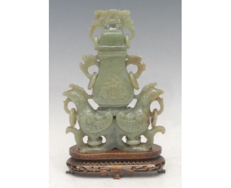 An early 20th century Chinese jade koro and cover on stand, scrolling dragon mask handles, supported by a pair of phoenixes, 