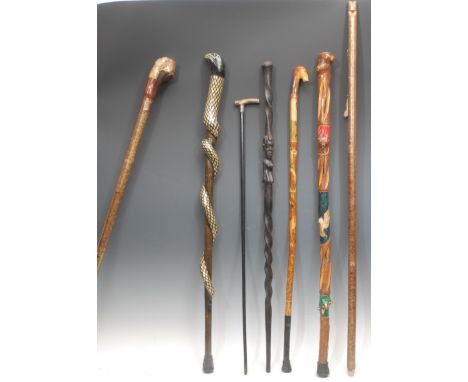 An Edwardian silver mounted walking stick, horn handle, silver collar, ebonised cane, 81.5cm long overall, Chester 1902; othe