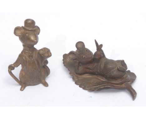 Continental School, a comical brown patinated cabinet bronze, of a mouse, reclining upon a leaf, with an apple, 11cm wide; an