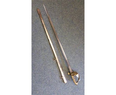 Ceremonial sword with steel scabbard, brass basket hilt and shagreen grip.