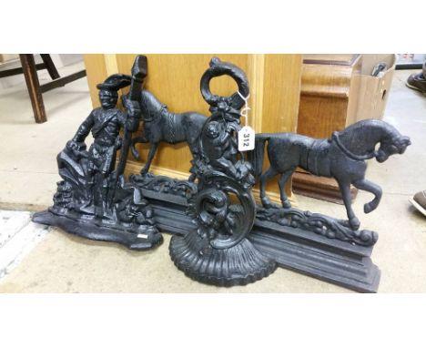 4 Cast iron door stops.