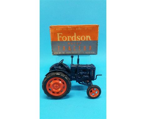 A boxed Chad Valley Fordson Major Tractor.