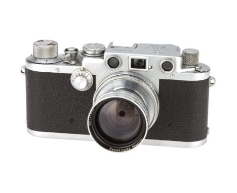 A Leica IIIf Rangefinder Camera, 1951/52, chrome, serial no. 592872, with Leitz Summitar f/2 50mm lens, 1951, chrome, serial 