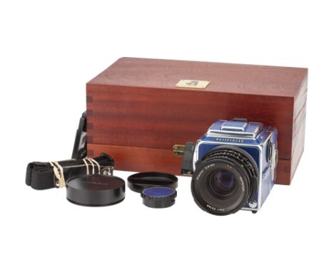 A Hasselblad 503CX Blue Medium Format Camera, 1989-1994, blue, serial no. 11EP23909, with Carl Zeiss Planar T* f/2.8 80mm len