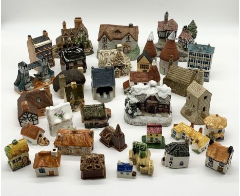 A collection of ceramic houses, buildings etc. 