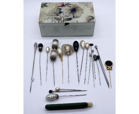 A small collection of vintage hatpins