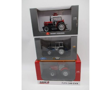 A collection of three boxed Universal Hobbies die-cast model tractors including a Ford 7810 Silver Jubilee, Massey Ferguson 2