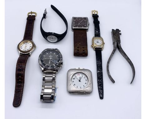 A collection of various watches along with a Hugoniot Tissot watch makers tool
