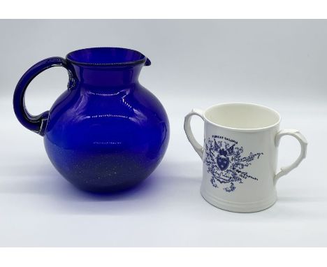 A Bristol blue glass jug along with a Coalport commemorative loving cup for the General Election 1892, Members for Shropshire