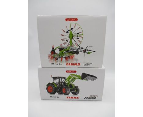 A boxed Wiking Claas Arion 650 tractor with front loader die-cast model (No 0773 25), along with a Wiking Claas Liner 2600 Sw