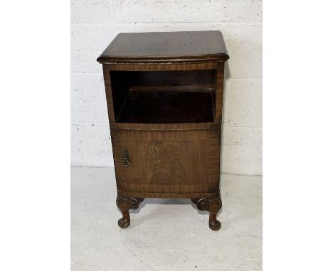 A vintage walnut beside cabinet with cupboard under 