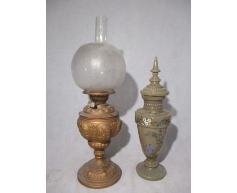 A Victorian oil lamp along with an milk glass urn with lid