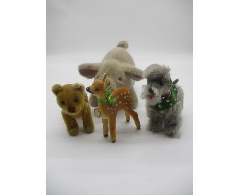 Four vintage Steiff soft animals, bear, dog, deer and pig, all with button.