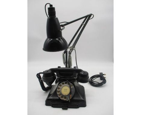 A vintage telephone and an anglepoise lamp.