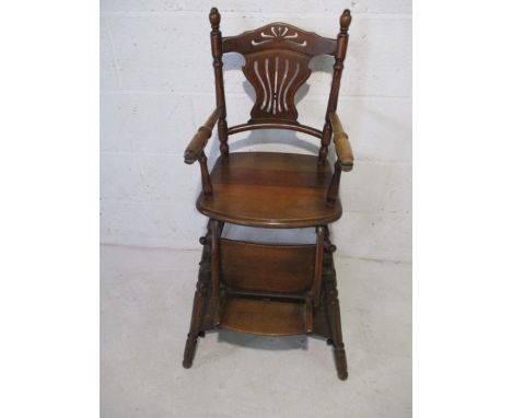 A vintage metamorphic child's high chair