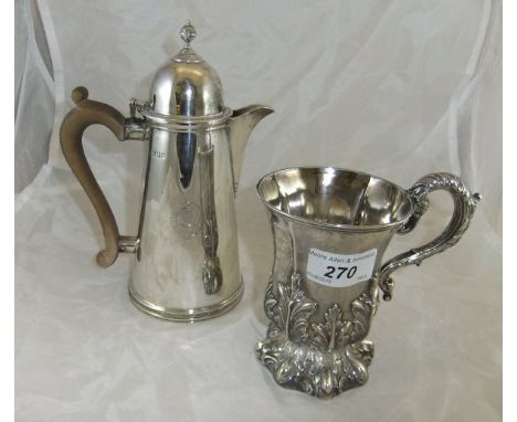 A George V silver water jug of 18th Century domed style (London 1920), and a Victorian silver Gothic style acanthus decorated
