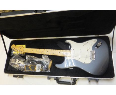 A Fender American Standard Stratocaster electric guitar, charcoal frost metallic, maple neck, Serial No. Z9323509, together w