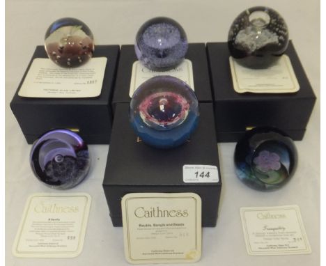 A collection of six Caithness glass paperweights - "Tranquillity", No'd. 201/750, "Atlantis", No'd. 698/1500, "Night Venture"