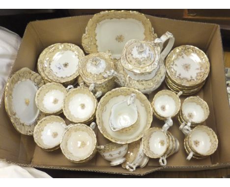 A 19th Century Rockingham style Staffordshire gilt decorated tea service to include teapot, sucrier, cream jug, slop bowl, va