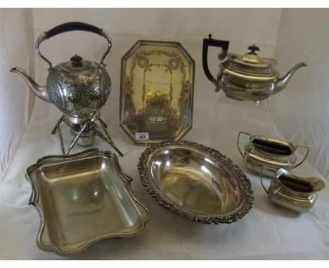 A collection of plated wares to include spirit kettle, three piece tea set, octagonal tray, etc.