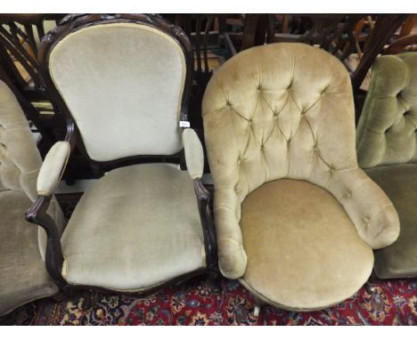 An early Victorian salon chair in pale yellow button back upholstery, on turned mahogany legs to white china castors, togethe