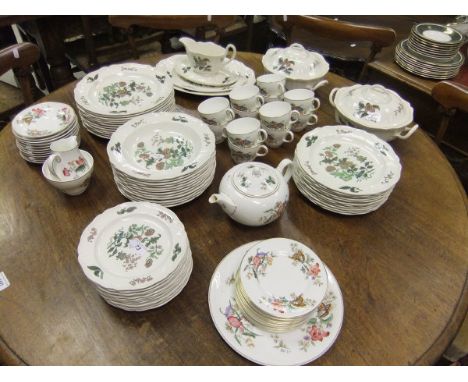 A collection of Wedgwood Barlaston "Mandarin" pattern dinner wares to include two lidded tureens, two meat plates, gravy boat