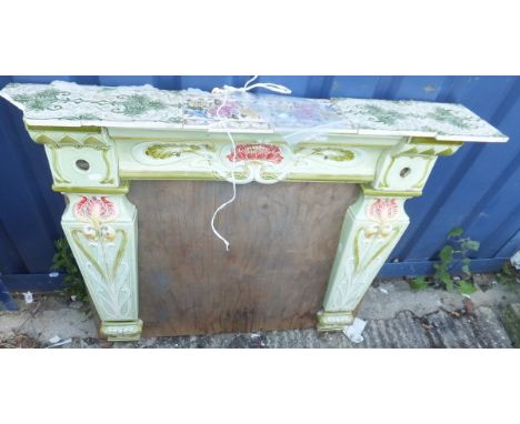 A ceramic fire surround in the Art Nouveau taste