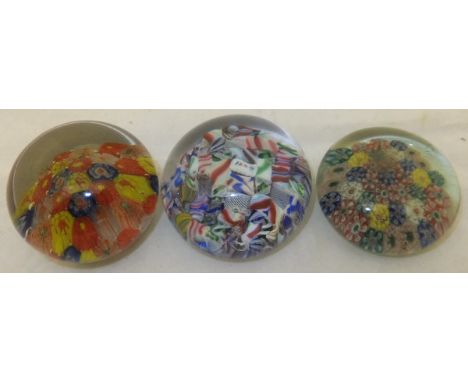 A Victorian chequered type glass paperweight, bearing date cane inscribed "1847", together with two Victorian bouquet type mi