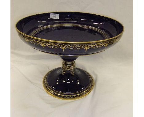 A large Sevres porcelain tazza decorated in cobalt blue and gilt, bearing printed mark to base "Dore A Sevres 76", together w