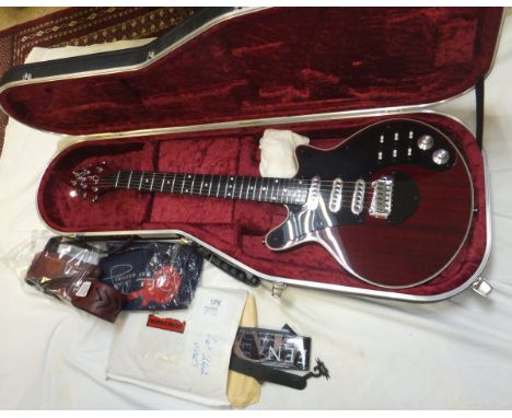 A BMG "Brian May Red Special" electric guitar, Serial No. BHM10086, with strap, Hiscox hard case, T-shirt, Queen strap, signe