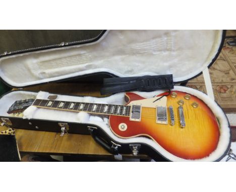 A Gibson Les Paul Traditional HC electric guitar circa 2009, Serial No. 012790435, together with Gibson hard carrying case in