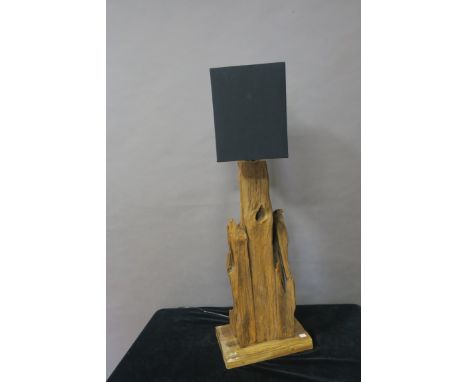 A CONTEMPORARY TABLE LAMP, in the form of driftwood with a rectangular black shade 93cms high