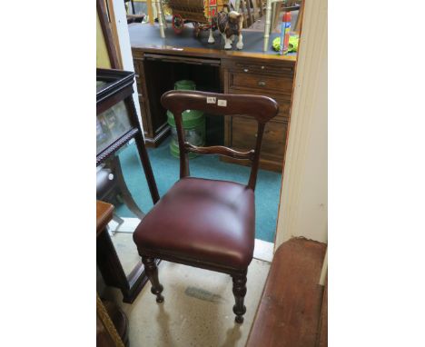 A VICTORIAN MAHOGANY FRAMED SINGLE CHAIR, the rectangular open back with shaped rail wine leather upholstered seat on ring tu