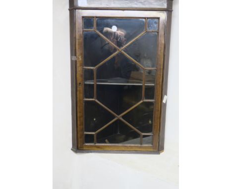 A 19TH CENTURY MAHOGANY MARQUETING INLAID WALL MOUNTED CORNER CABINET, cupboard moulded cornice above an astragal glazed door