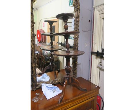 A MAHOGANY THREE TIER DUMB WAITER, each moulded shelf joined by baluster support.